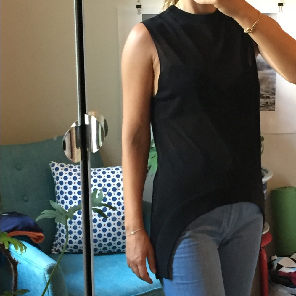 Thin black top w asymmetrical hem